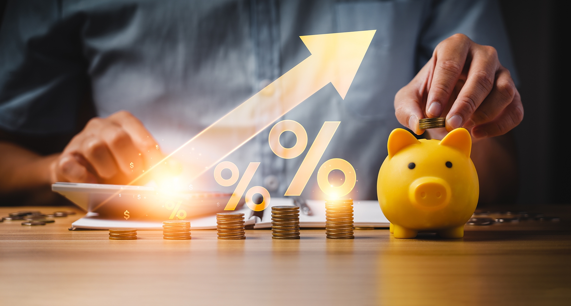 stacked coins, piggy bank and upward arrow