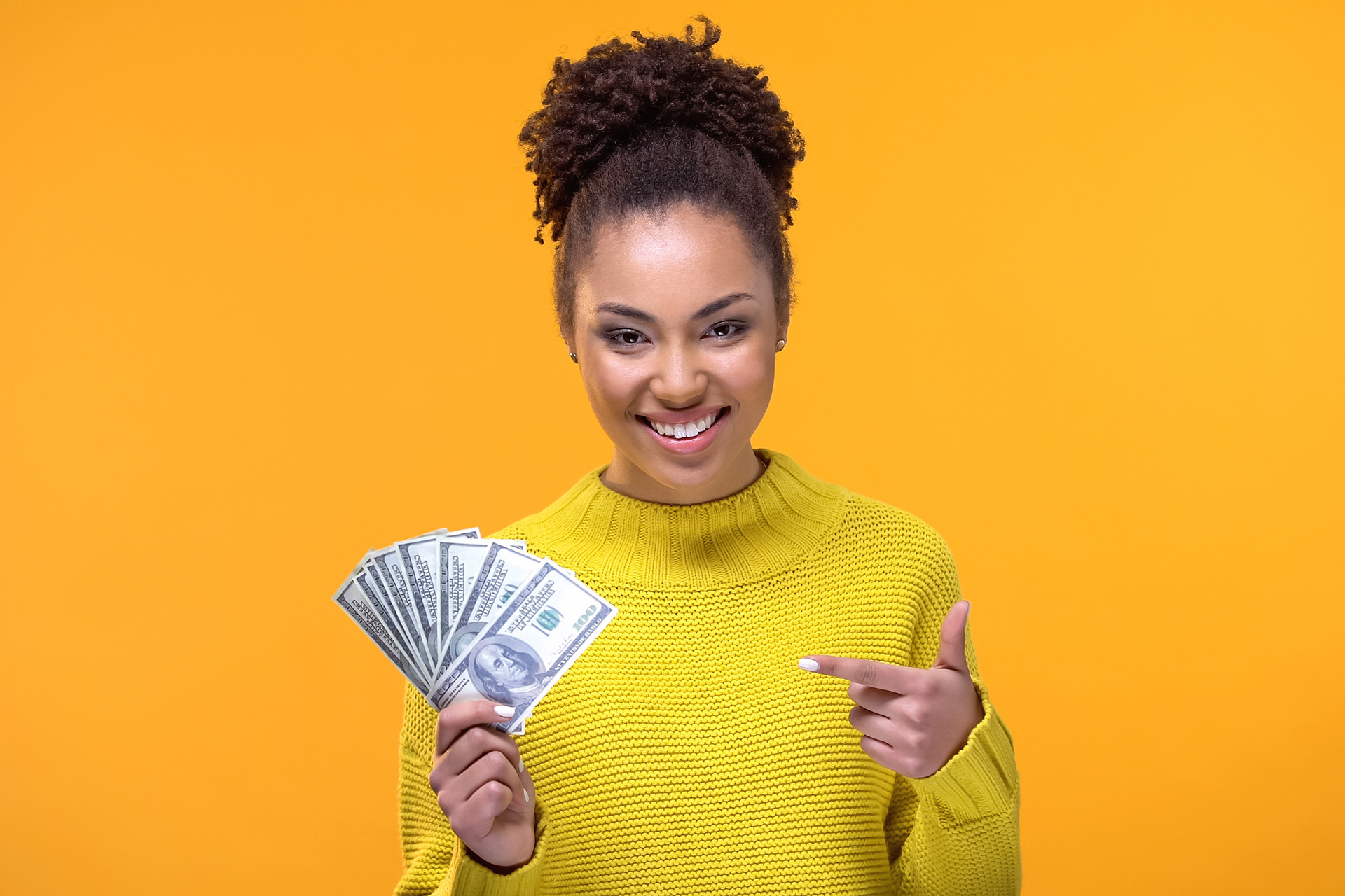 woman holding cash